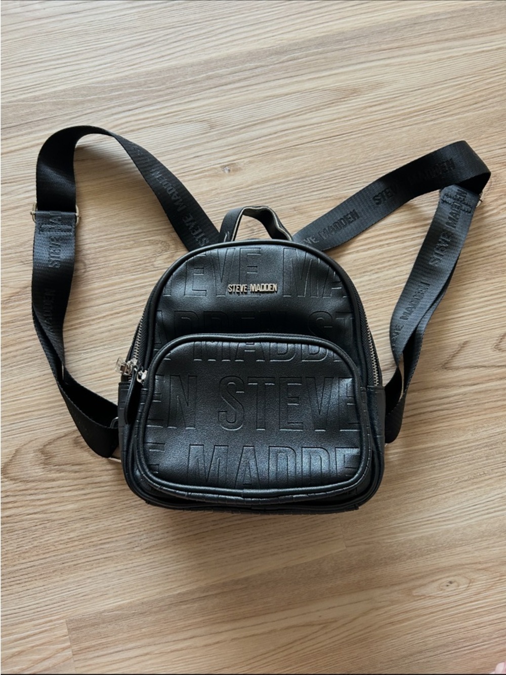 Steve Madden Black Embossed Logo Mini Backpack